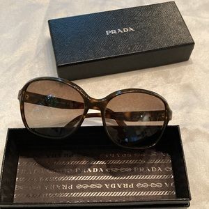 Vintage Prada women’s sunglasses in brown tones in case and box